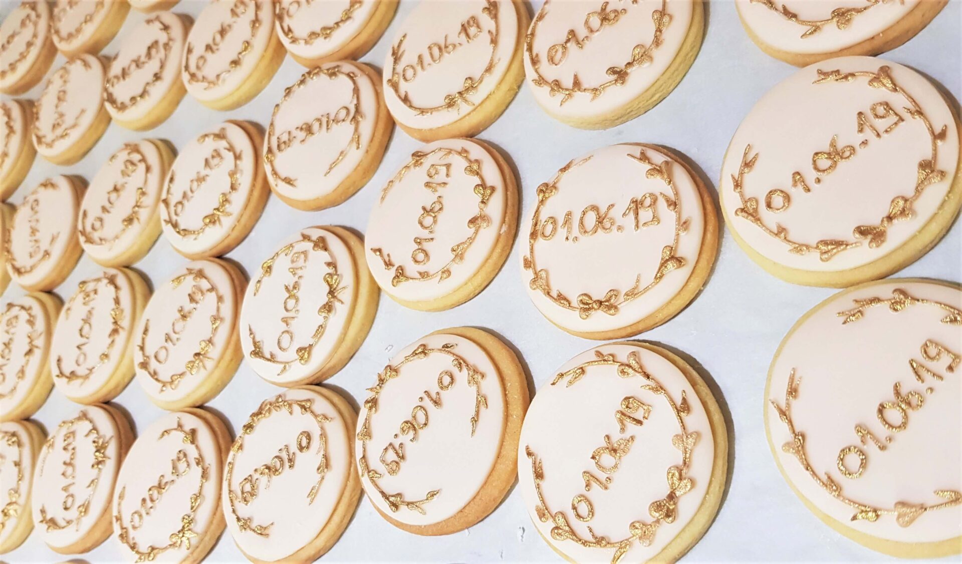 Custom Biscuit Wedding Favours to compliment your wedding cake By Yevnig London