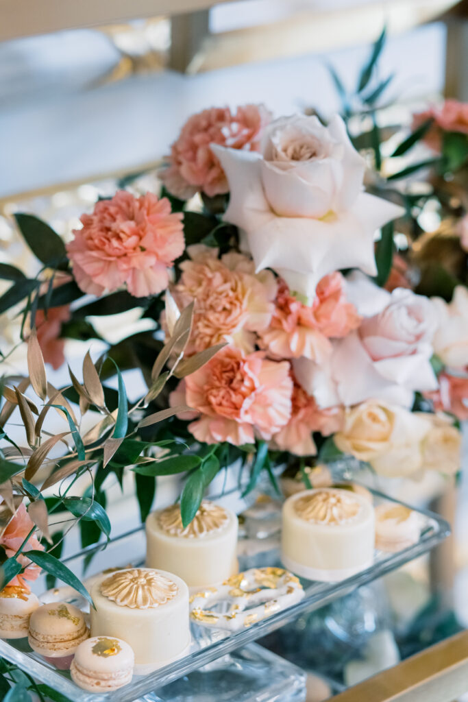 Wedding floral design from Bloominghaus on luxury dessert table By Yevnig