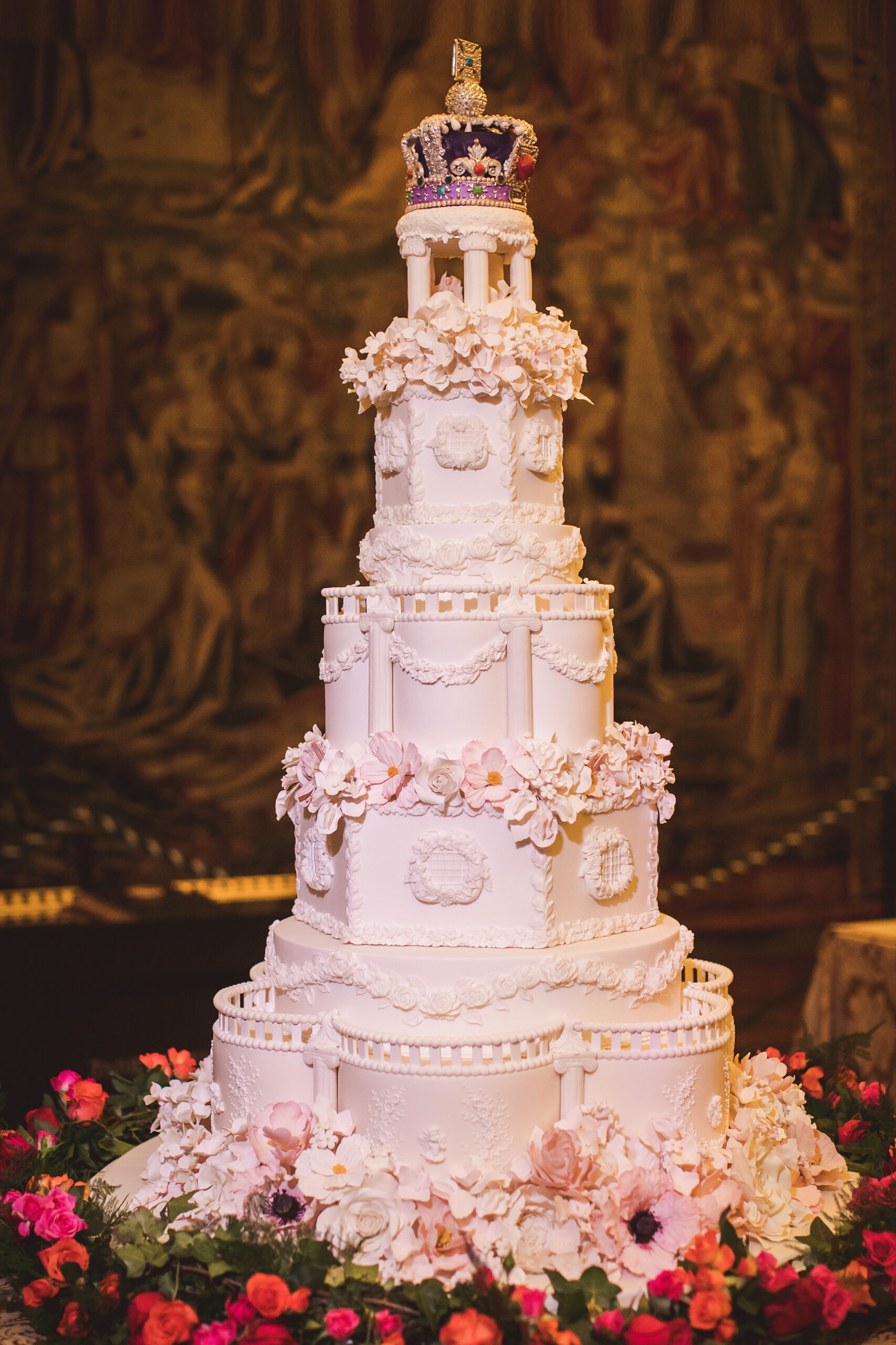 Opulent wedding cake By Yevnig with representation of the Imperial State Crown on top. Photographed by Nick Rose Photography at Hampton Court Palace