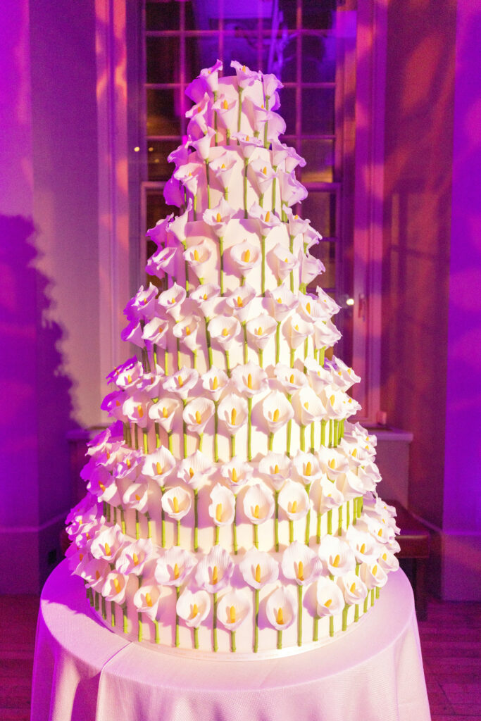 Magnificent contemporary floral wedding cake decorated with 500 calla lilies created in sugar paste